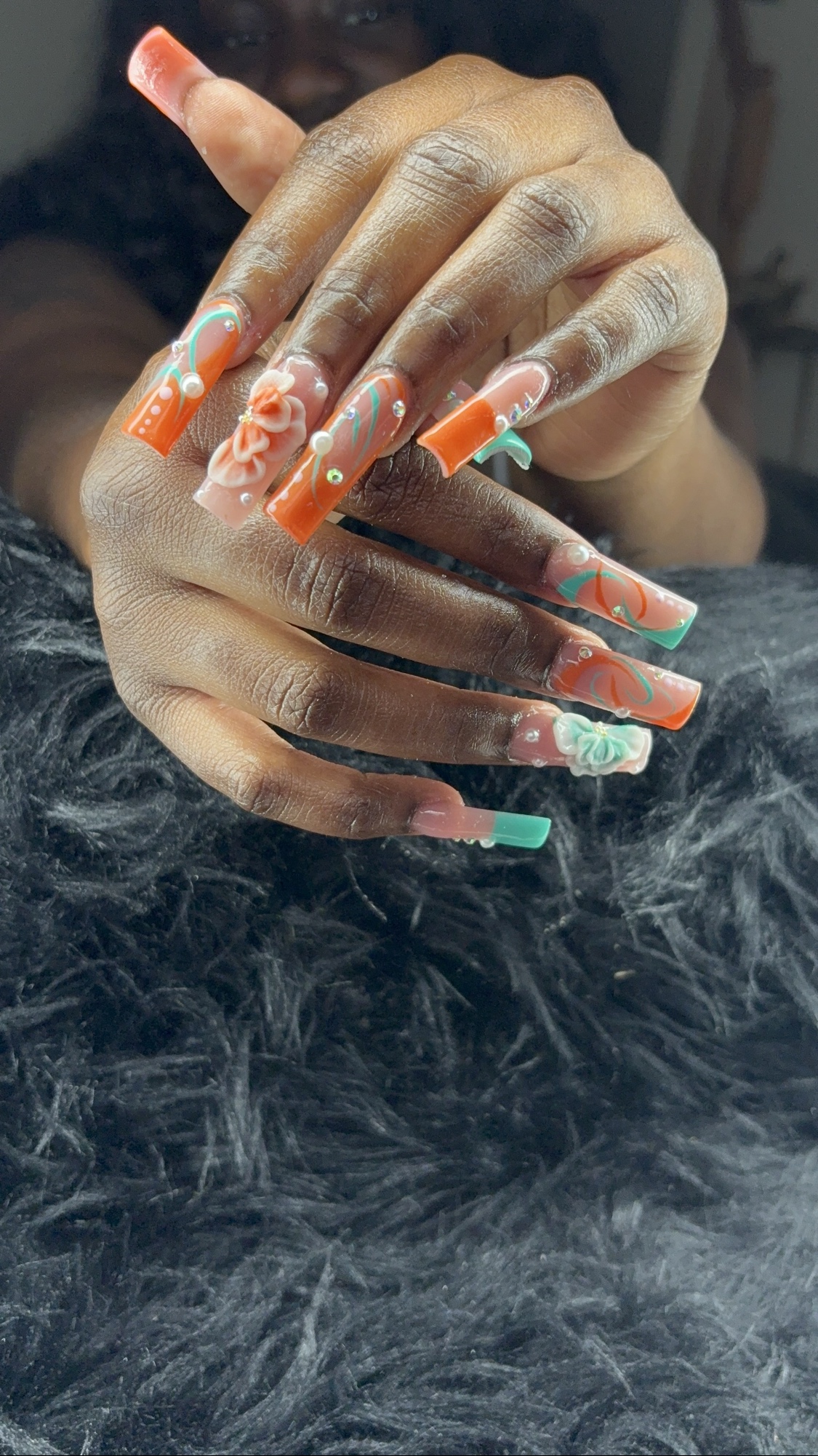 Orange teal 3D flower nails